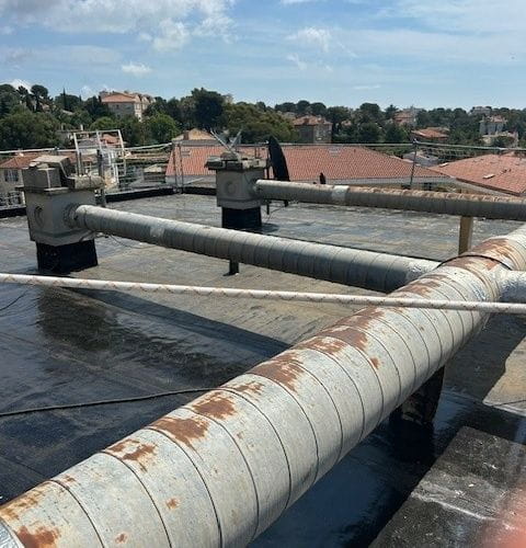 Mise en oeuvre de la nouvelle étanchéité - isolant knauf thane ET 100mm et bicouche élastomère type Elastophéne Flam 25