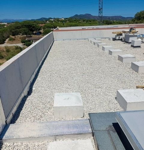 Travaux sur toiture terrasse inaccessible - Protection lourde de gravillon