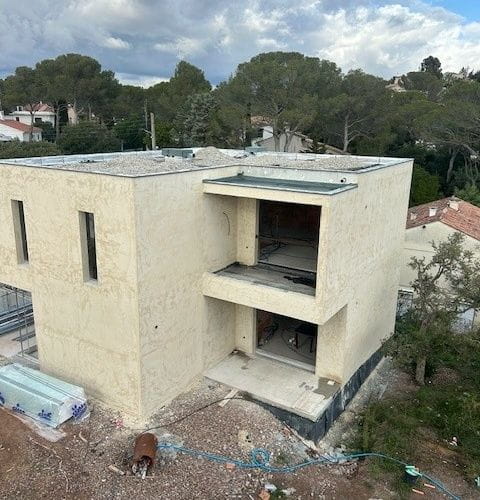 Protection lourde : pose de gravillons